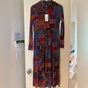 Johnny was dress. Sheer but comes w slip dress. Long sleeves and maxi